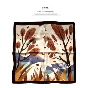 Close-up detail of luxury mulberry silk square scarf featuring artistic forest and deer print.