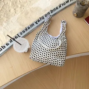 Koreanische französische schwarz-weiße Punkte Handtasche schicke Perlenarmband Umhängetasche