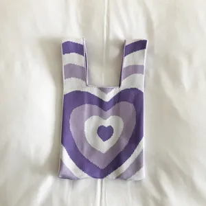Knit tote bag featuring a chic purple and white heart pattern for casual daily wear.