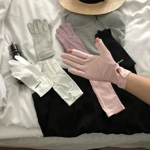 Detailed view of summer UV protection touchscreen gloves in various colors with outfit match.