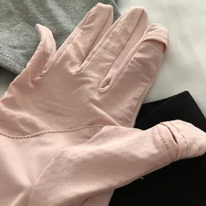 Pink UV protection cycling gloves with touchscreen fingertips and anti-slip silicone dots.