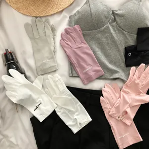 Detailed view of summer sun protection gloves in multiple colors, lightweight and breathable.