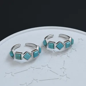 Retro ethnic style silver open rings set with blue square imitation turquoise stones for women chic.