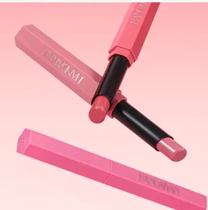 Close-up detail of the pink hexagonal matte lipstick tube, showing smooth texture.
