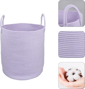 Detailed view of large purple cotton rope storage basket showing handle and woven texture.