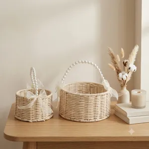 Detail view of woven gift baskets featuring elegant pearl handles and white organza bows.