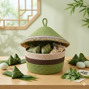 Cotton woven storage basket with lid, green handmade container for gifts and home organization.