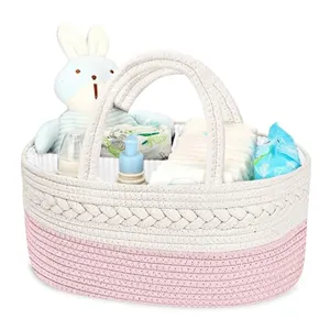 Baumwollseil Baby Windeltasche Korb Detail, rosa-weißer gewebter Aufbewahrungskorb.