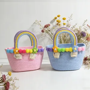Handmade cotton woven handbag with rainbow handles and pom pom details for women beach style.