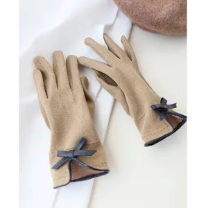 Women's winter faux suede touchscreen gloves with cute bow detail, warm fleece lining for cold weather.