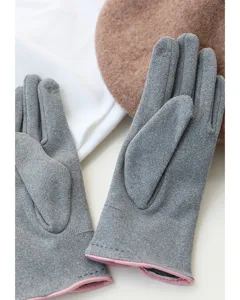 Detail view of women's autumn winter faux suede touch screen warm gloves in grey.
