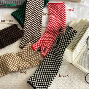 Designer Korean black and white checkered knit gloves, cozy medium long winter touchscreen gloves.