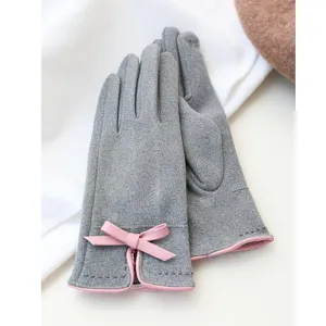 Grey faux suede touchscreen gloves with pink bow detail, perfect for winter warmth and daily wear.