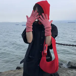 Red and white checkered knitted touchscreen gloves, stylish mid-length winter warm gloves.