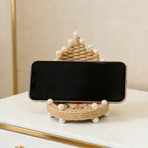 Soporte de teléfono de escritorio de cuerda de cáñamo hecho a mano para transmisiones.