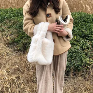 Detailed view of a cozy white plush handbag, soft furry texture, perfect casual daily use style.