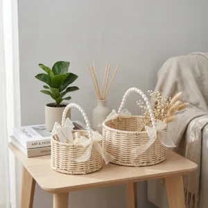 Wicker woven flower basket with pearl handle for wedding gift and home decor item