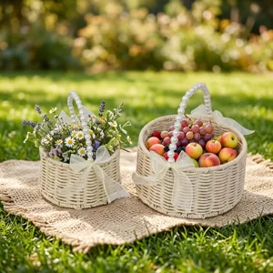 Woven flower basket with pearl handle and white bow, perfect for wedding picnic and gifts.