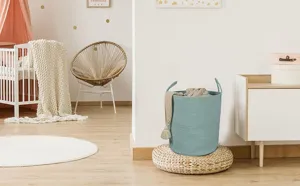 Nordic woven cotton rope storage basket scene detail view, ideal for nursery room organization.