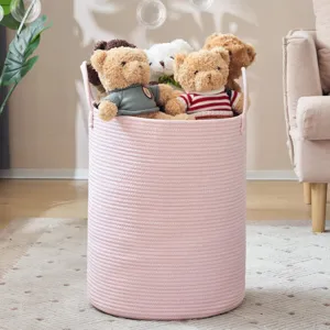 Pink cotton rope laundry basket, woven storage bin with handles for toys, clothes and home items.