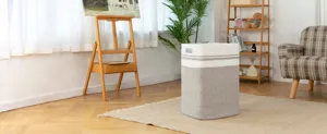 Vue détaillée du panier de rangement en corde de coton pour le linge, design élégant.