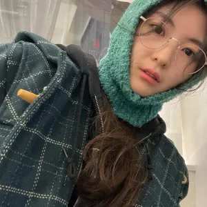Cozy green knitted balaclava winter hood for women, thermal earflap beanie hat warm.
