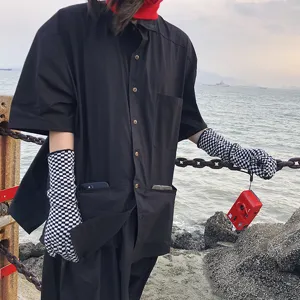 Black and white checkerboard knit gloves, minimalist plaid wool touchscreen gloves for winter.