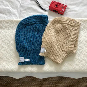 Knit balaclava hood detail view, cozy winter ear protection wool hat, two colors display scene.