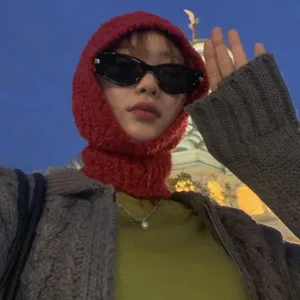 Cozy red knitted balaclava hat for women, winter warm ear protection hood for cold weather daily wear