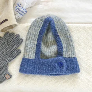 Knitted balaclava hat detail, color-block wool neck warmer hood, winter cozy warm accessory.