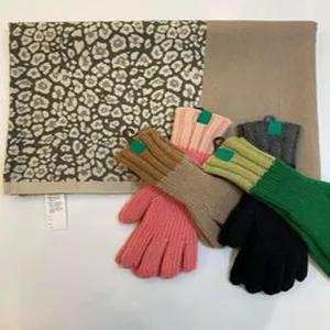 Knit scarf and winter gloves set, leopard print and solid brown design for women.