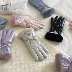 Winter warm padded gloves featuring plush fur trim and soft lining, perfect for cold weather.