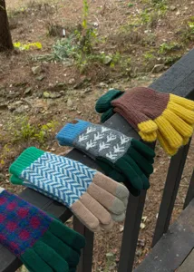 Winter color block knitted gloves feature stylish geometric patterns and cozy warmth for cold days.