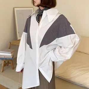 Chic contrast color long sleeve shirt with stylish scarf accessory for women spring fashion.