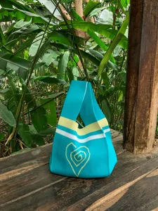 Handmade knitted tote bag with cute heart pattern and chic stripes, stylish daily handbag