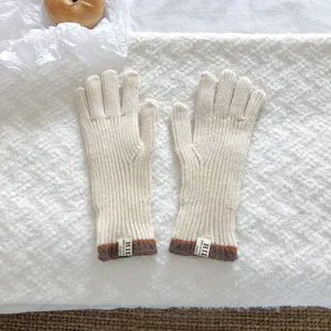 Knitted winter touch screen gloves in off-white with striped cuffs and fine texture detail.