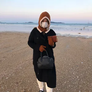 Winter women knitted hooded scarf gloves set chic black coat outfit outdoor beach detail view