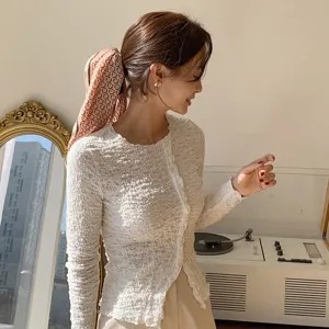 Chic hair silk scarf and textured long sleeve top set, stylish daily wear fashion.