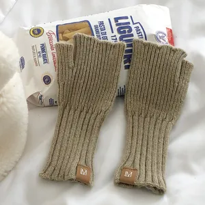 Guantes de punto sin dedos de invierno cálidos guantes de punto acanalado para mujeres y hombres