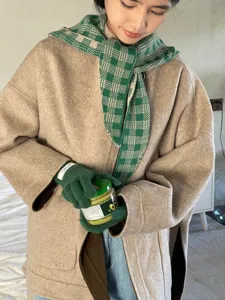 Korean style winter green plaid scarf and knitted gloves detail view in cozy daily wear.