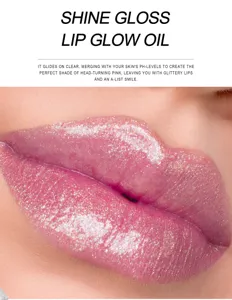 Glossy shimmer lip oil and plumping lip gloss detail showing sparkling pink tint effect.
