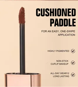 Matte liquid lipstick cushion paddle applicator wand detail shot showing soft brown creamy texture.