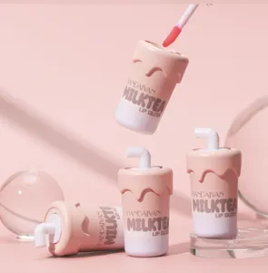 Cute milk tea cup lip gloss detail view showcasing soft matte texture and unique straw cap design.