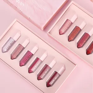 Detailed close-up of diamond-cut matte liquid lip gloss set in pink gift box packaging.