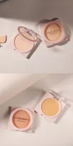 Vista detallada de polvos compactos HANDAIYAN con textura suave y elegante diseño rosa.