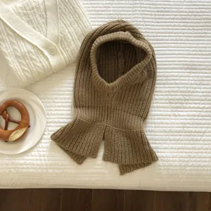 Cozy brown knitted balaclava winter warm hoodie scarf all-in-one cozy apparel detail shot