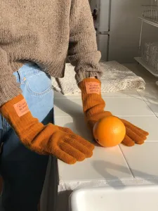 Warme Herbst und Winter Strick Wollmischung Handschuhe in orange für Alltag und Radfahren.