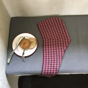 Knitted houndstooth balaclava scarf combo detail view showing pink and brown pattern