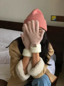 Thickened warm knit winter gloves with plush fleece cuffs, soft cozy pink design for daily wear.