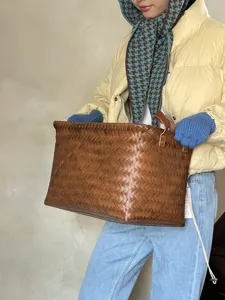 Handwoven storage basket and stylish houndstooth knit balaclava scarf set for women.